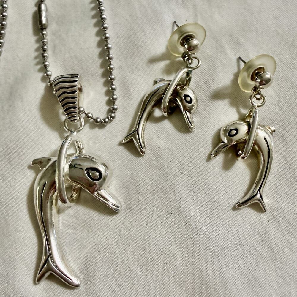 Silver tone Dolphin Necklace & Earrings Set.